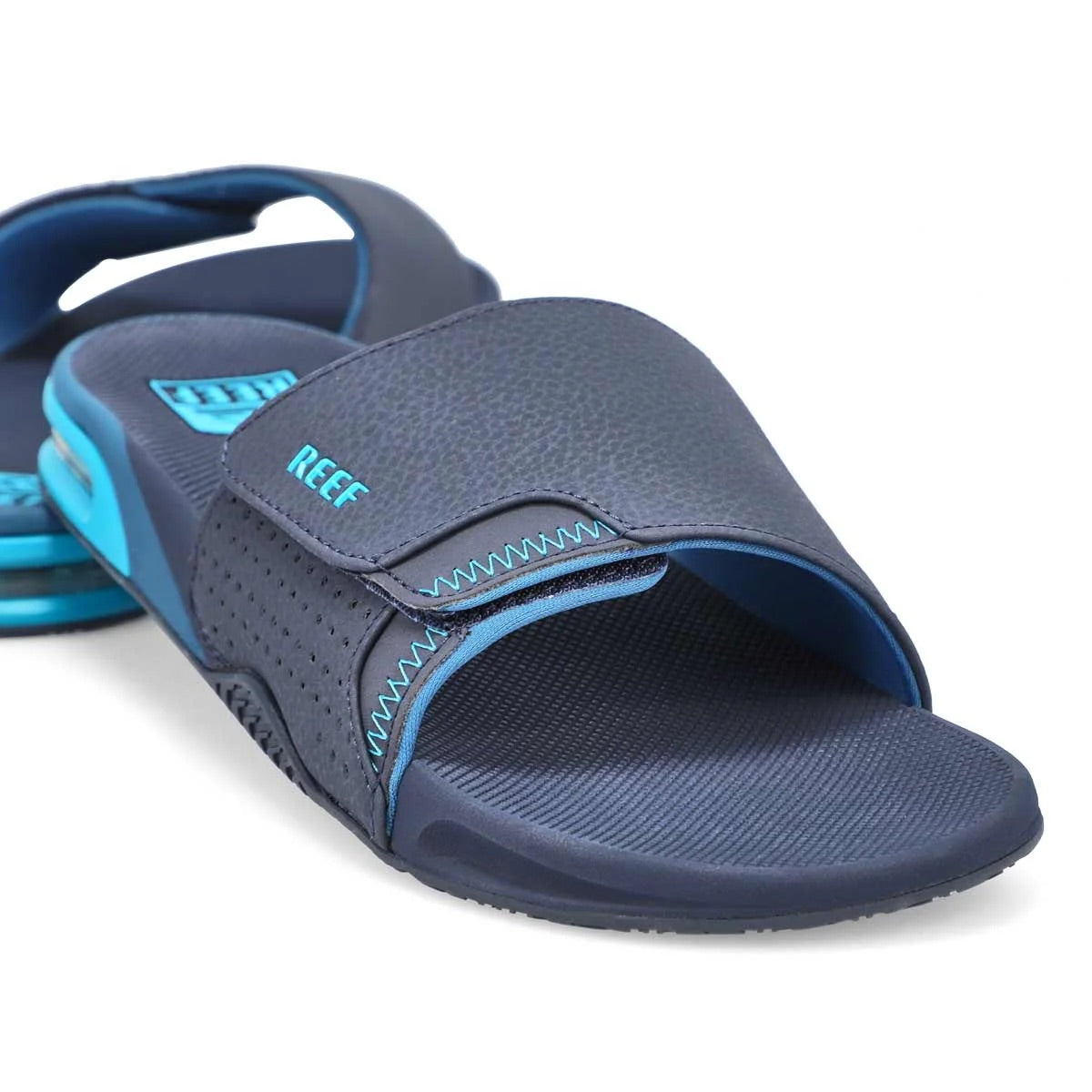 REEF MEN'S FANNING SLIDE IN OCEAN
